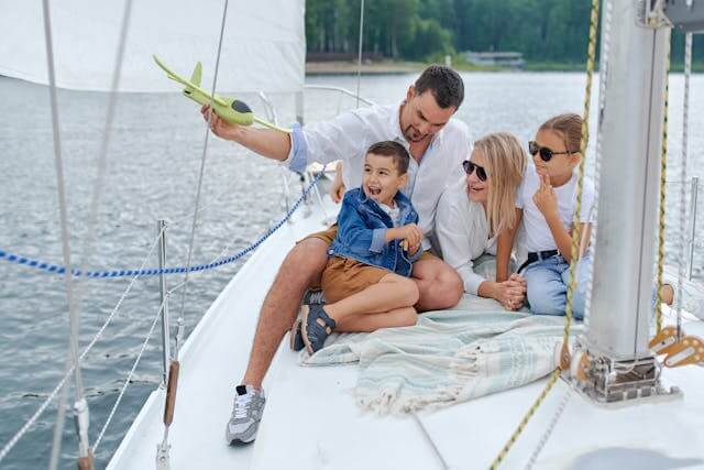 Family Enjoying Boating Together | OS Marine Services